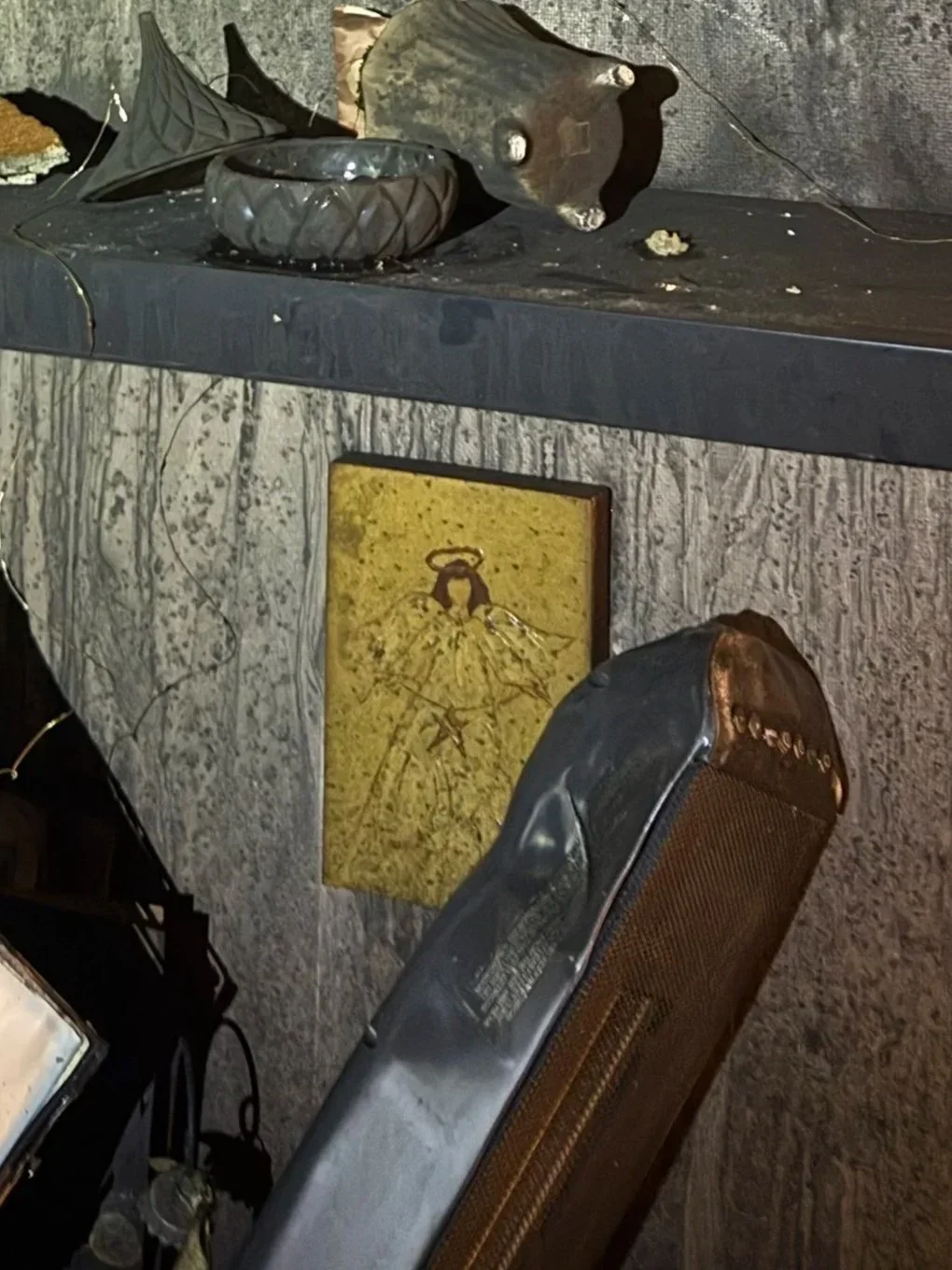  The guardian angel is the only thing left on the walls in the office where the fire was contained. 