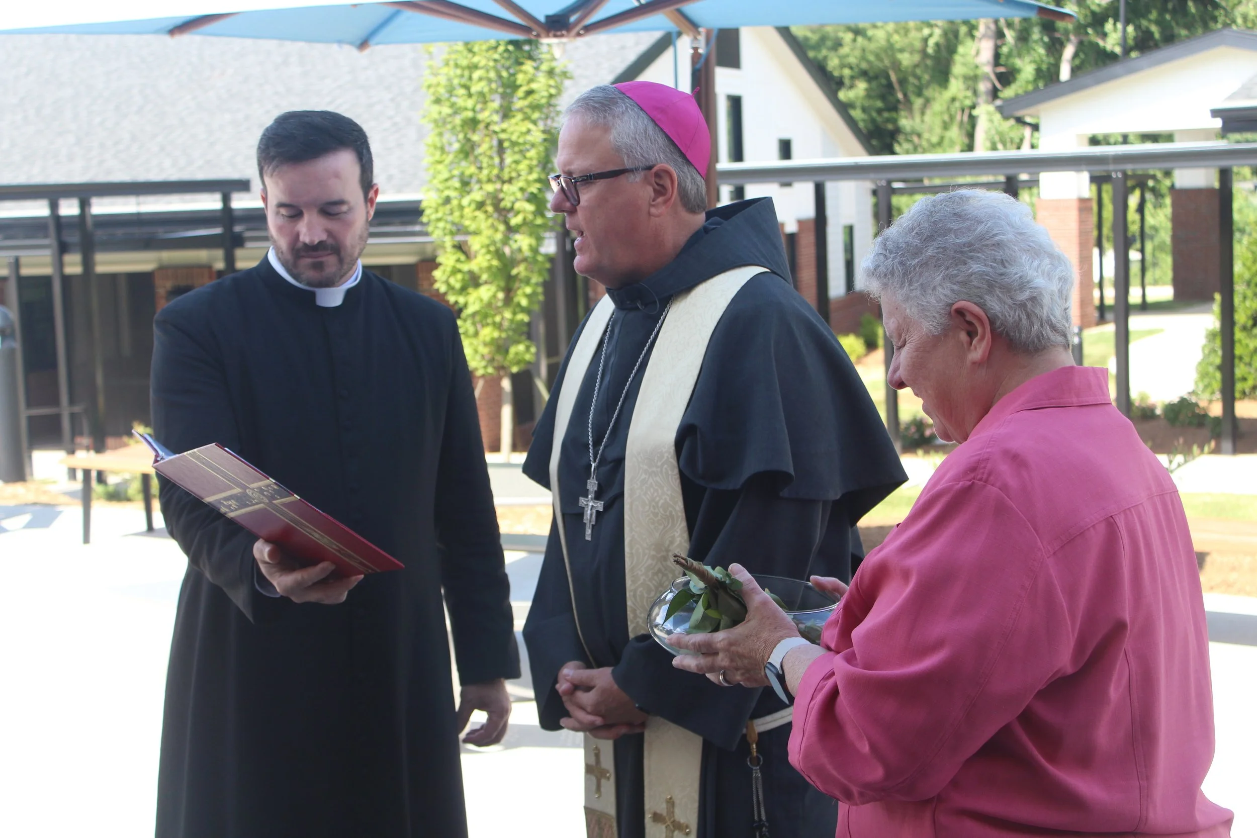 Bishop Martin blesses the campus.JPG
