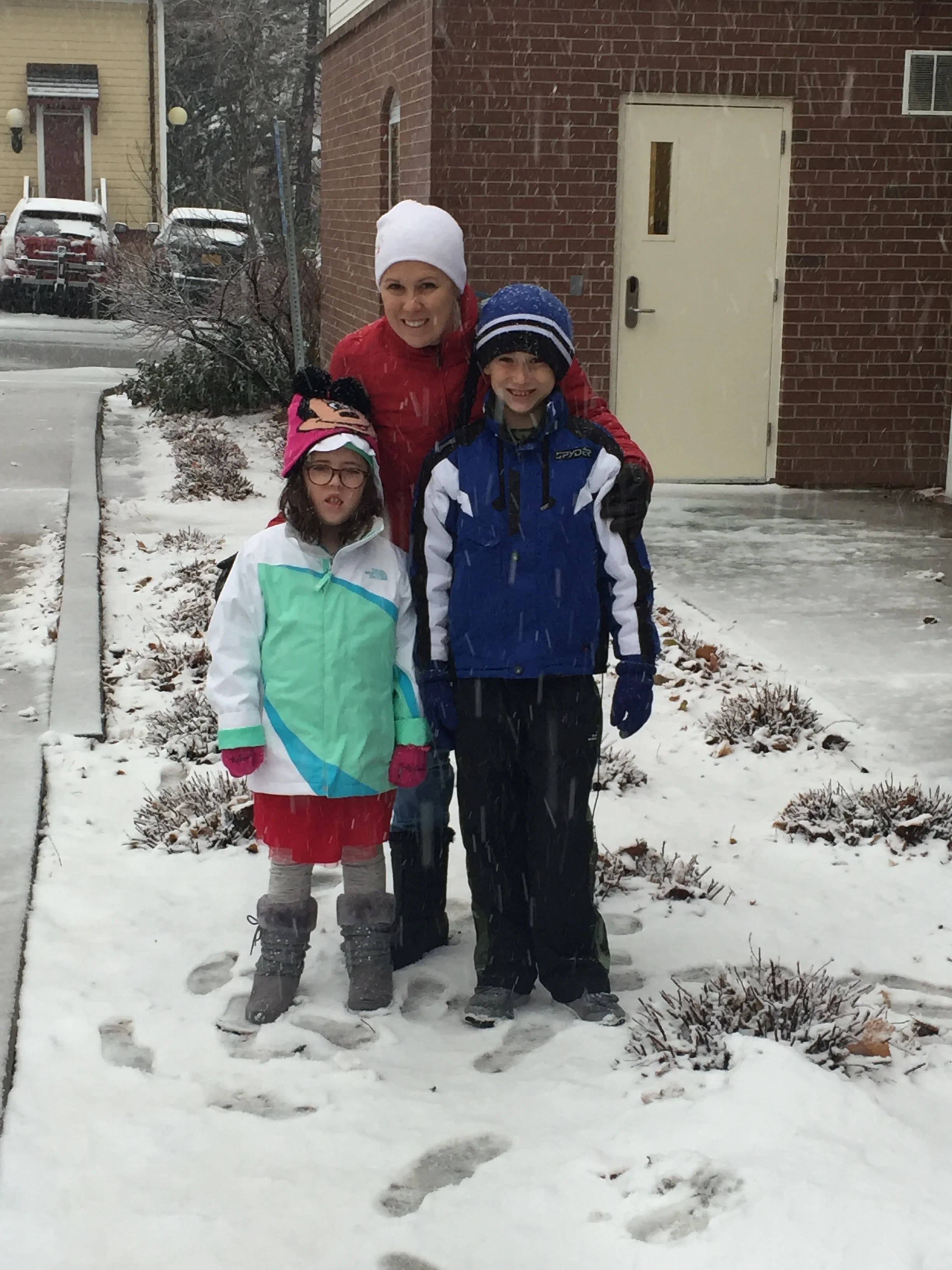 Kate, Elizabeth and Charlie just a few weeks ago outside the University of Utah where Kate has participated in a Congenital DM research study for the past three years.
