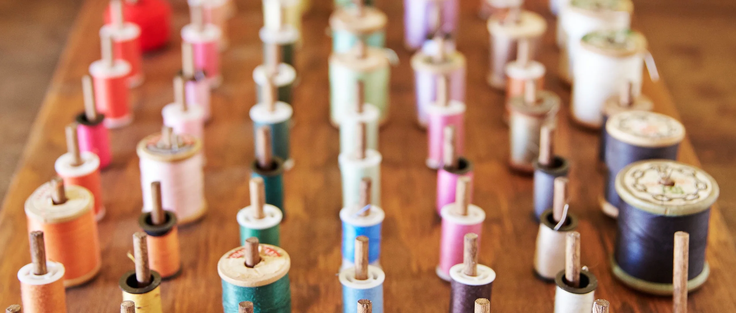 Salvaged thread installation by Cecilia Lim