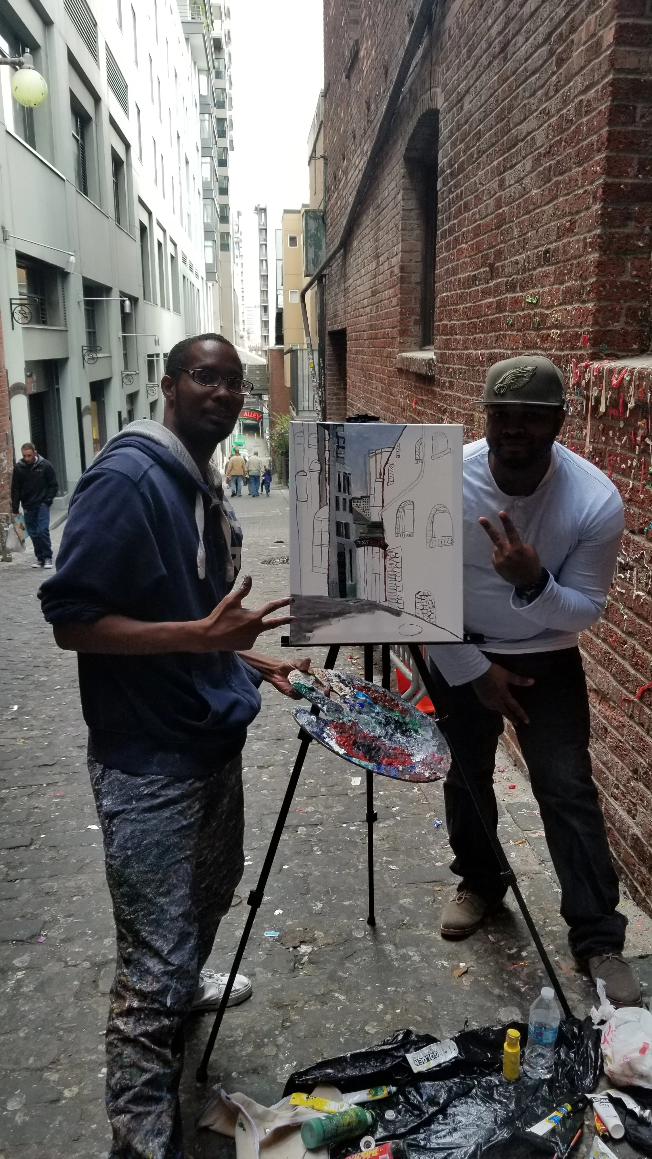 Me and my older brother taking a pose with my new artwork. 