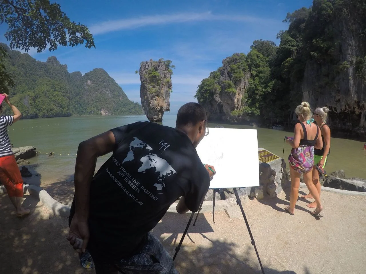 Me sketching out the layout painting on the canvas. 