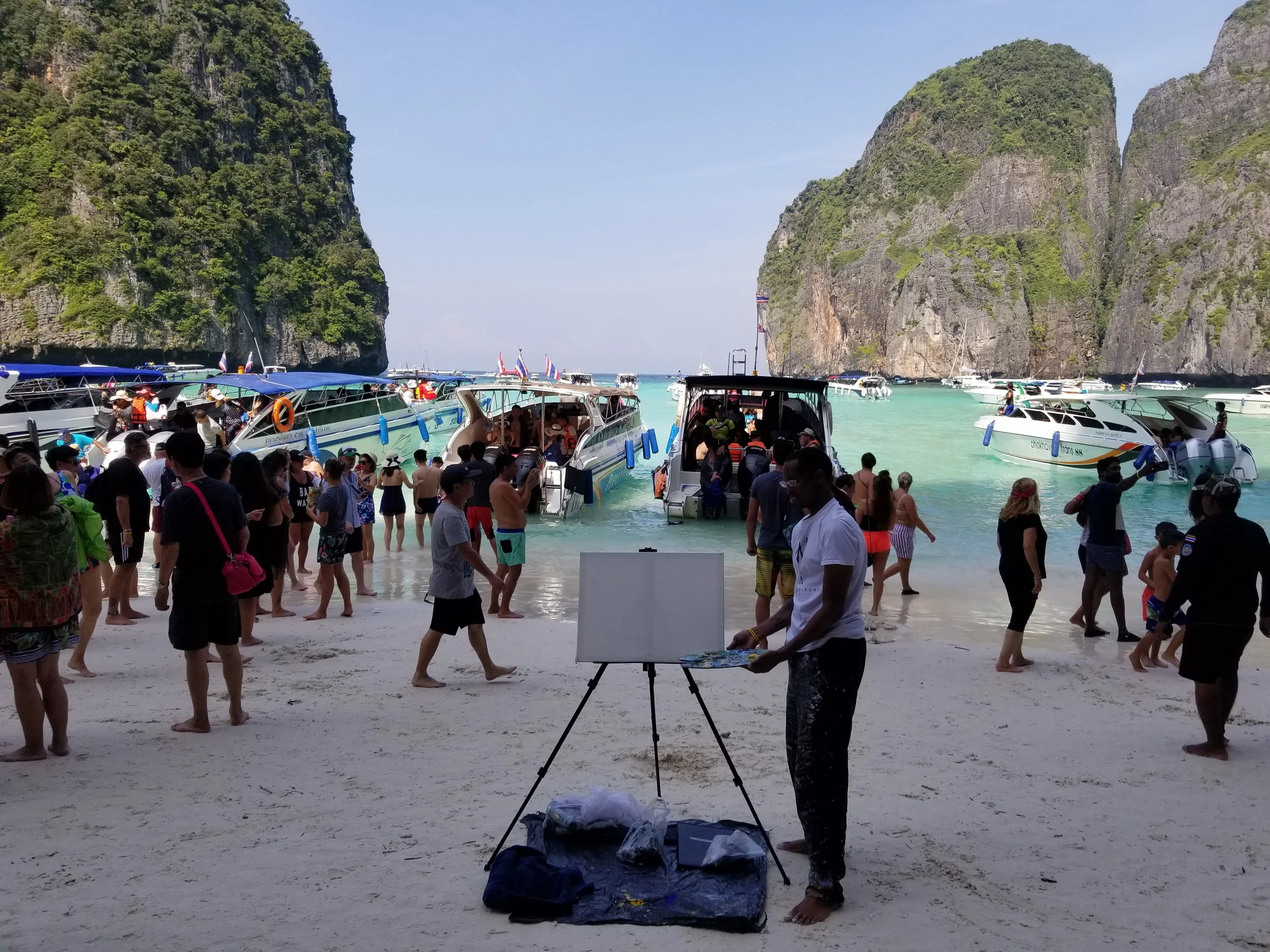 Me at my live painting show event on the beach at Maya Bay in Phi Phi Islands. 