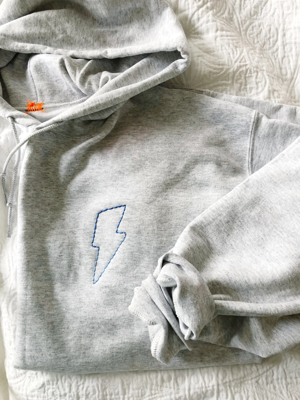 Lightning Bolt Embroidered Hooded Sweatshirt | Order She Wrote
