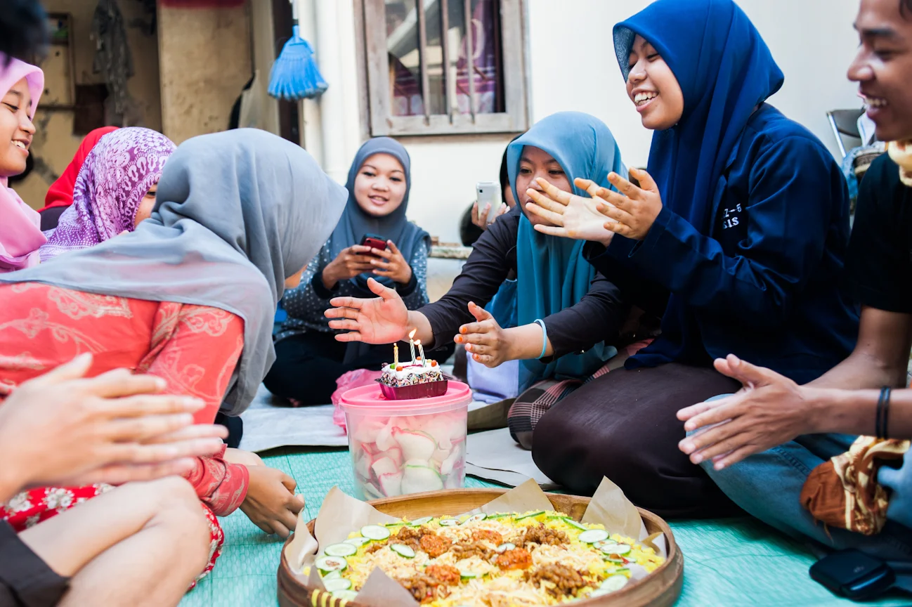 Members of PMII celebrate the birthday of one of their friends and fellow members.