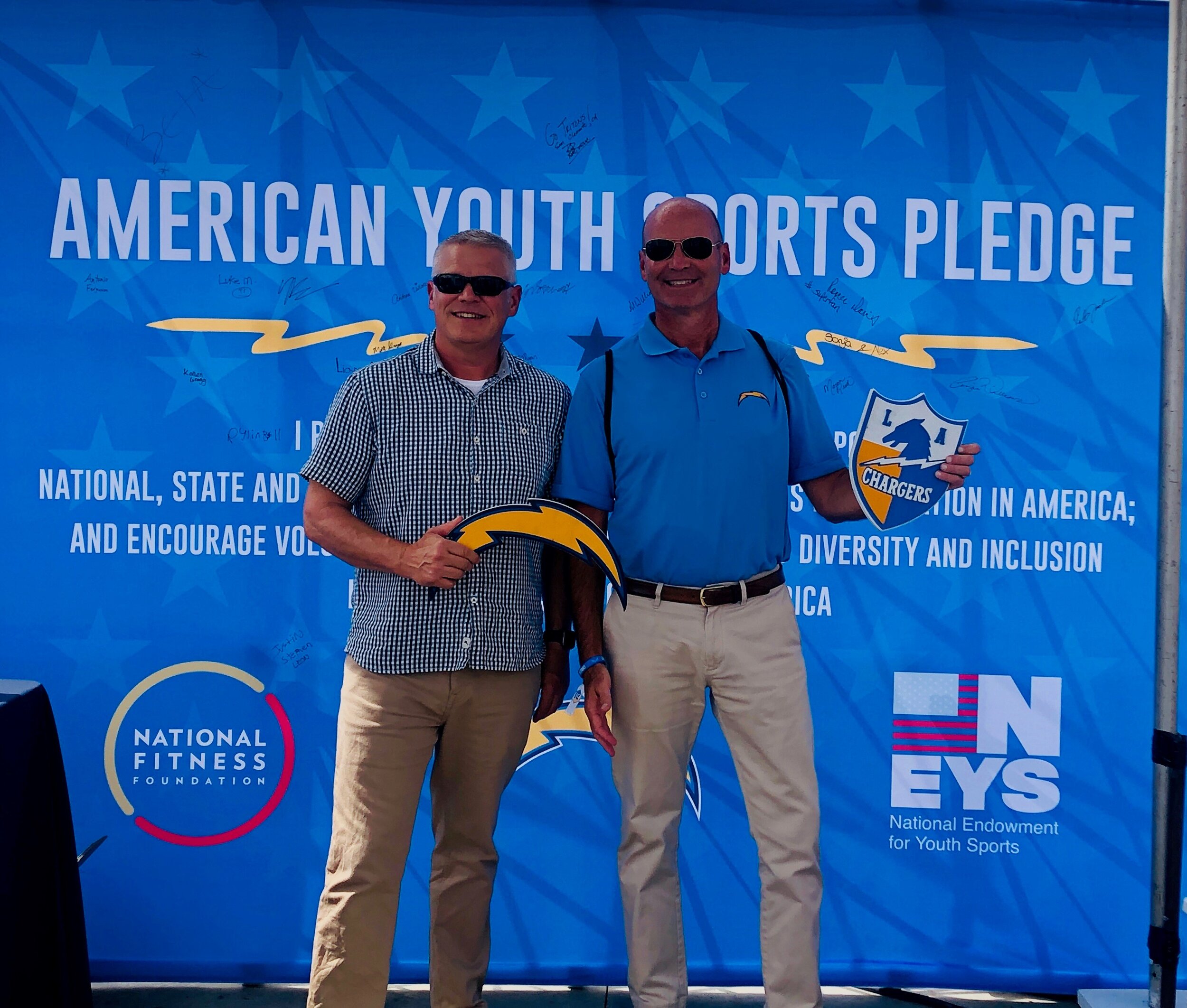  Executive Director, Clay Walker, at a Los Angeles Chargers event in support of the American Youth Sports Pledge. 