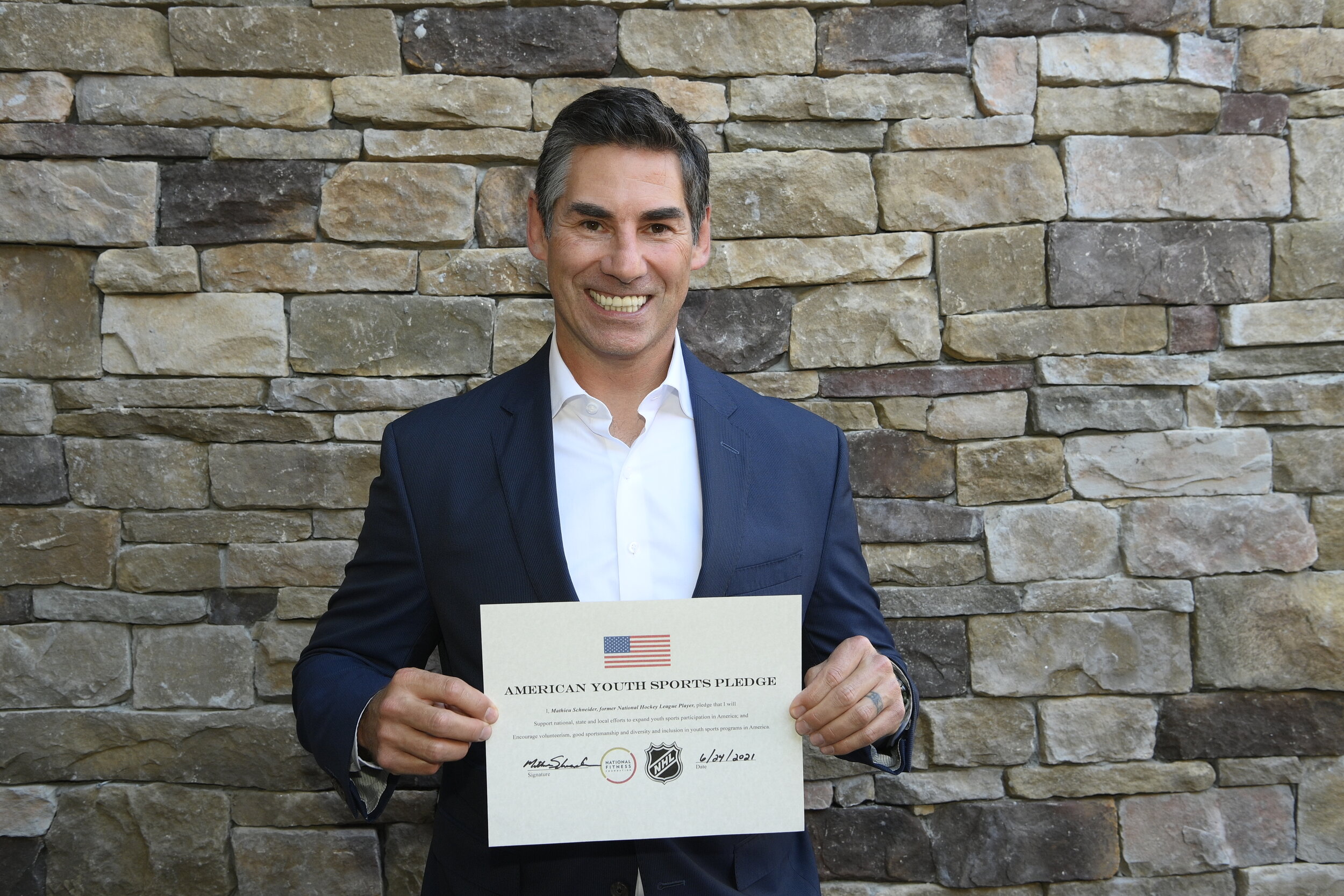  Mathieu Schneider, former NHL Player, takes the American Youth Sports Pledge. 
