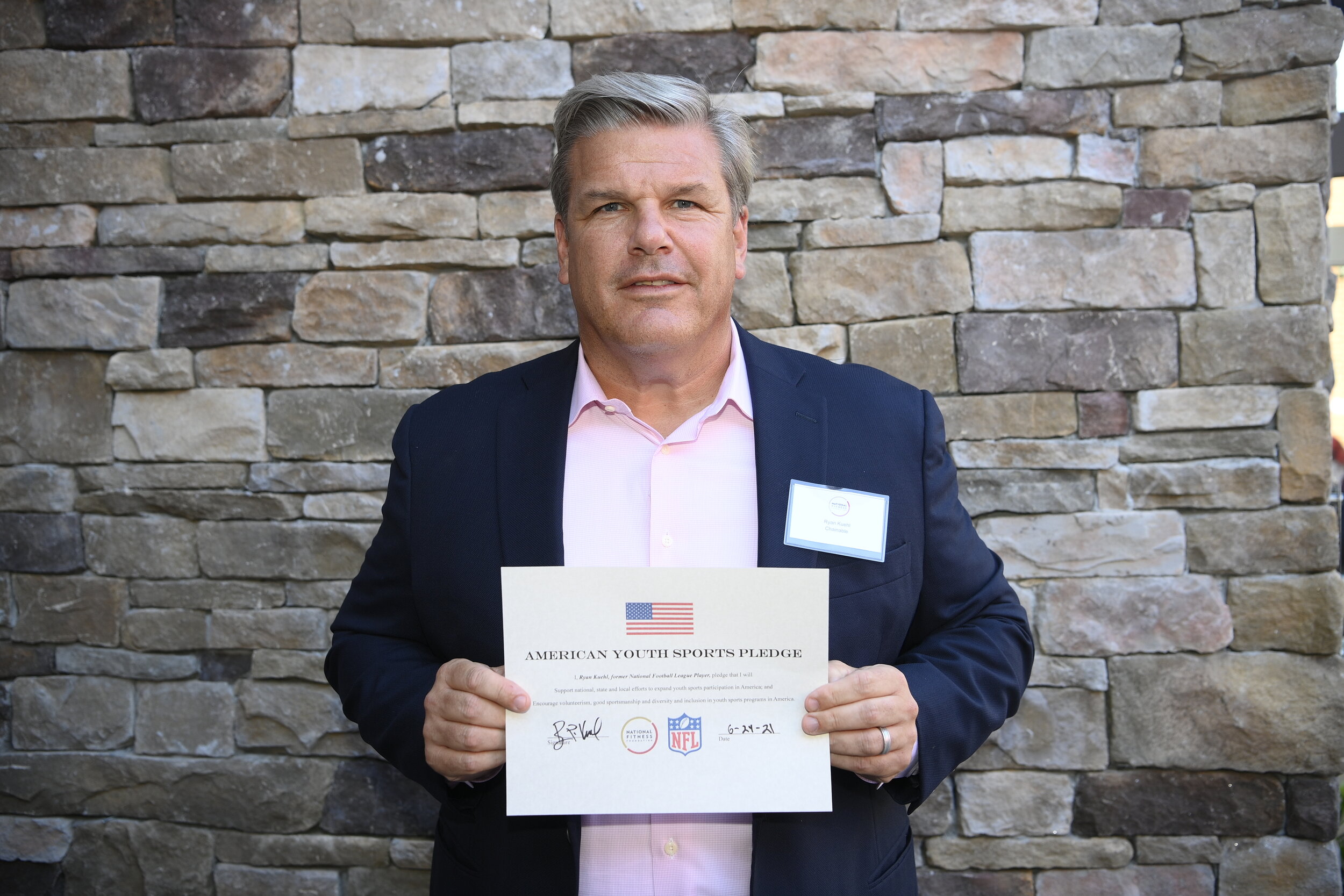 Ryan Kuehl, former NFL player, takes the American Youth Sports Pledge. 