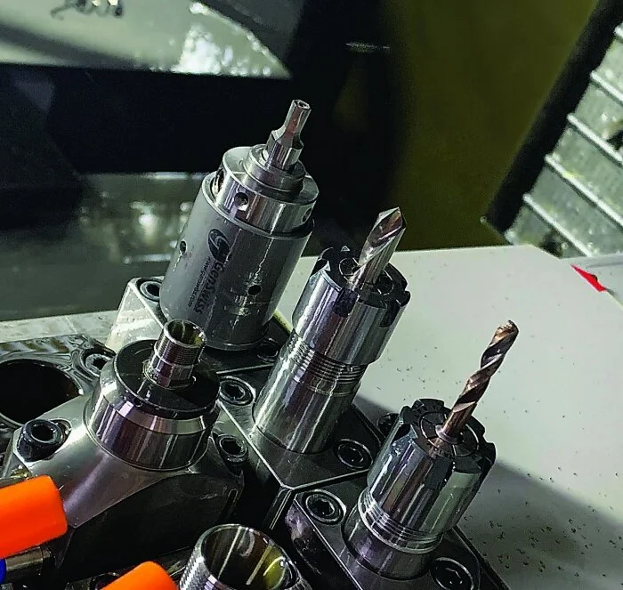 A Rayco #7 rotary broach (left) set up on a machine at Radax Industries. Image courtesy of Radax Industries