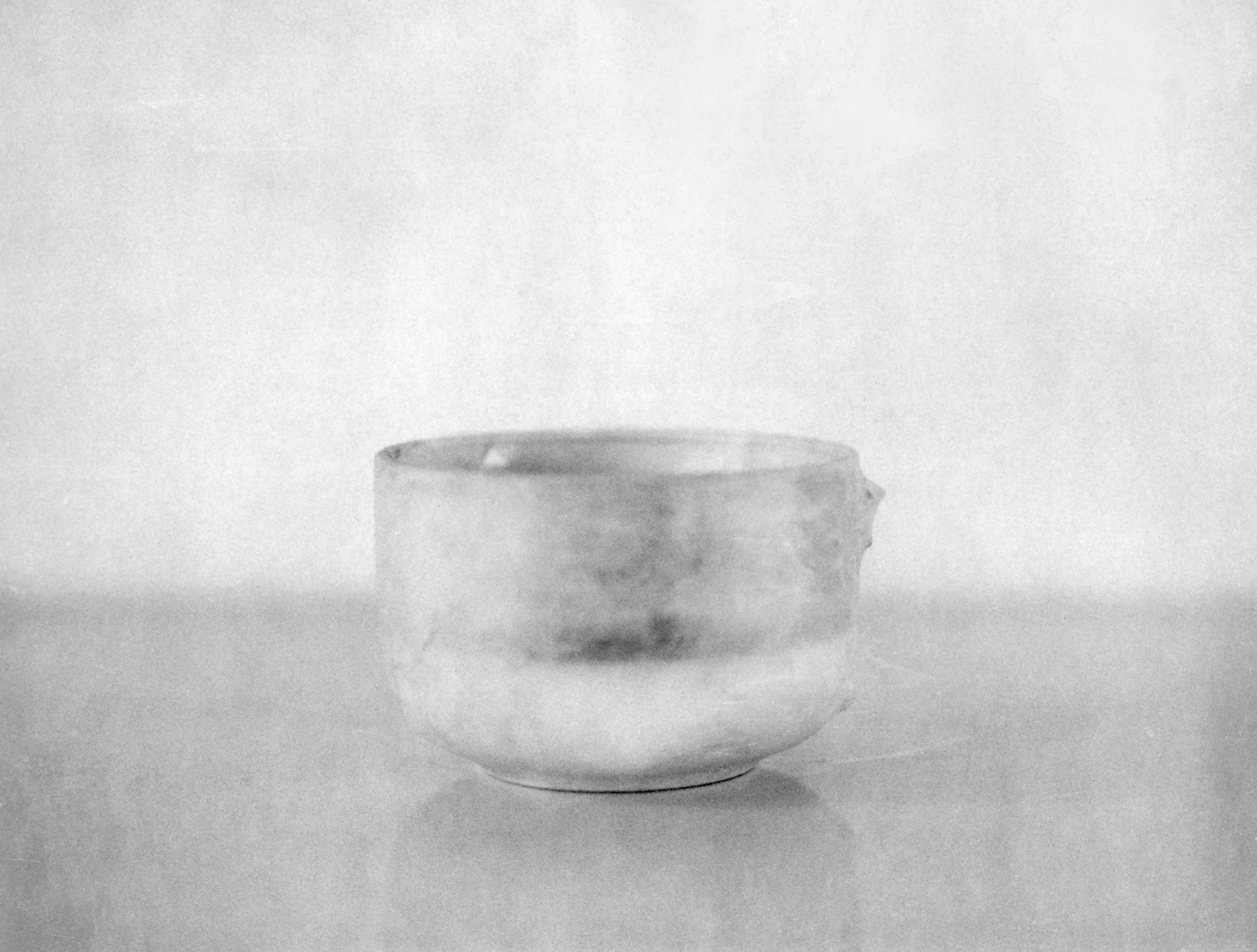 Papered Cup with Broken Handle
