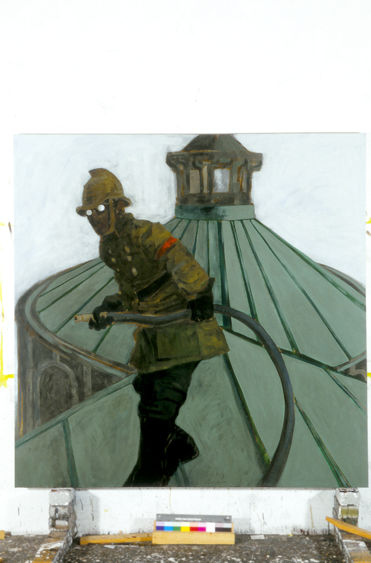 Shostakovitch, dressed as a fireman, on the roof of the Leningrad Conservatoire, 1941