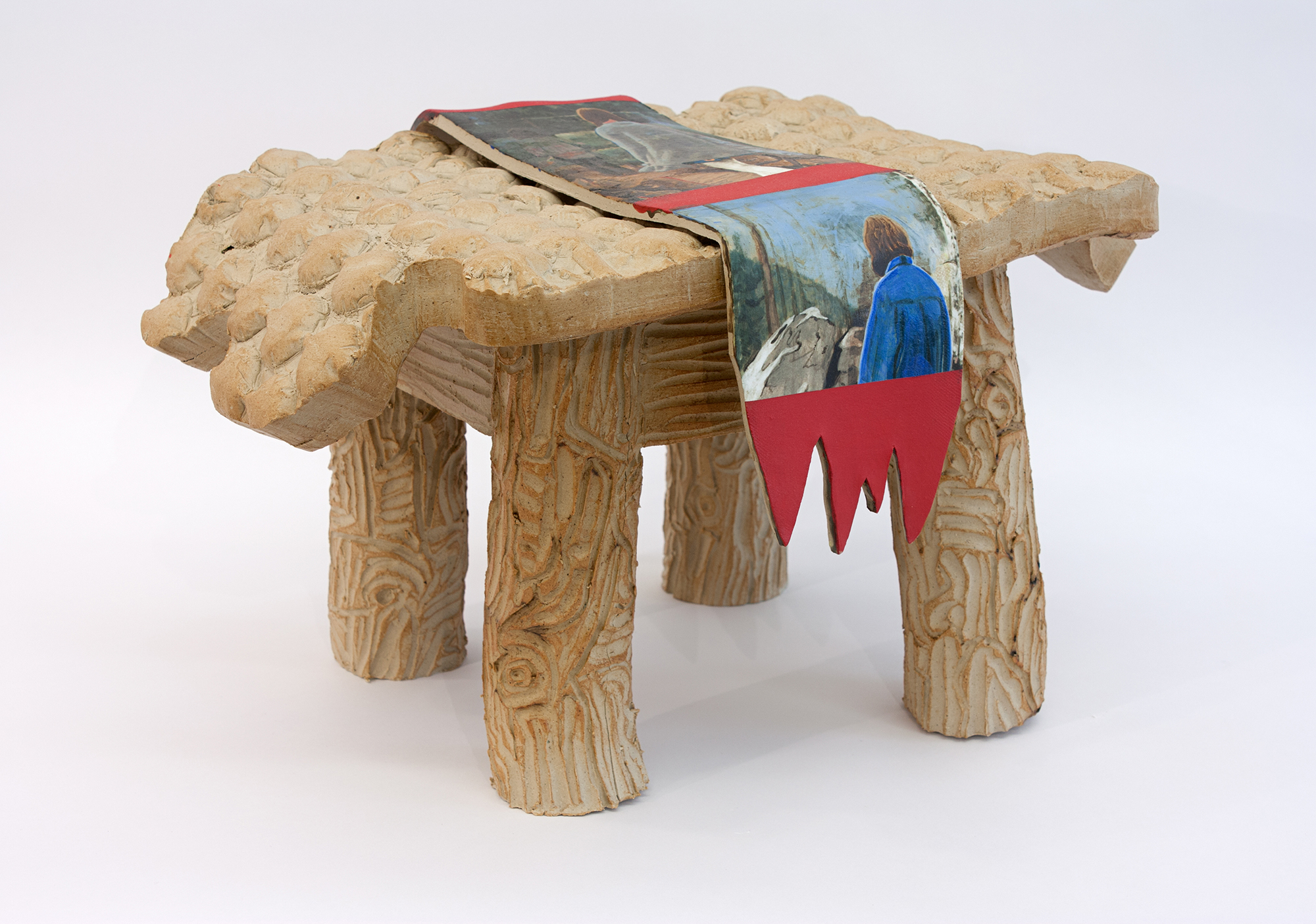 Table with figures looking away , 2014 stoneware with underglaze 18 x 16 x 20 inches