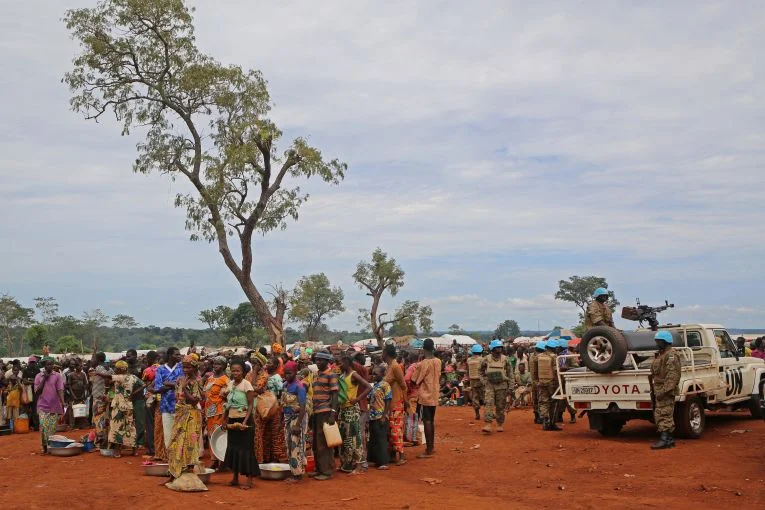 Displaced people wait for rations in Bria, Central African Republic, on Sept. 26. (Cassandra Vinograd/The Washington Post)