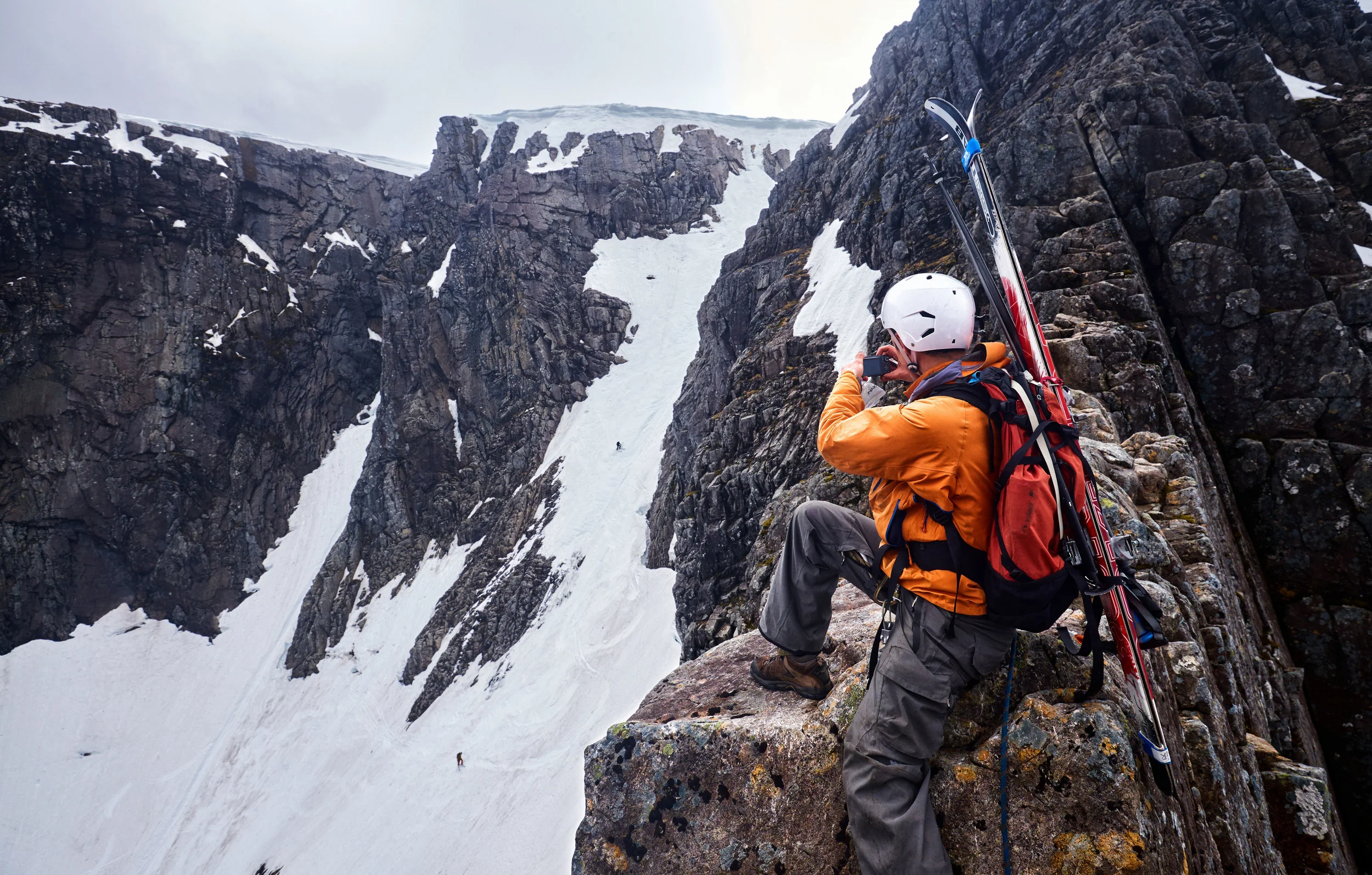 Watching skiers descend Tower Gully from high on Tower Ridge