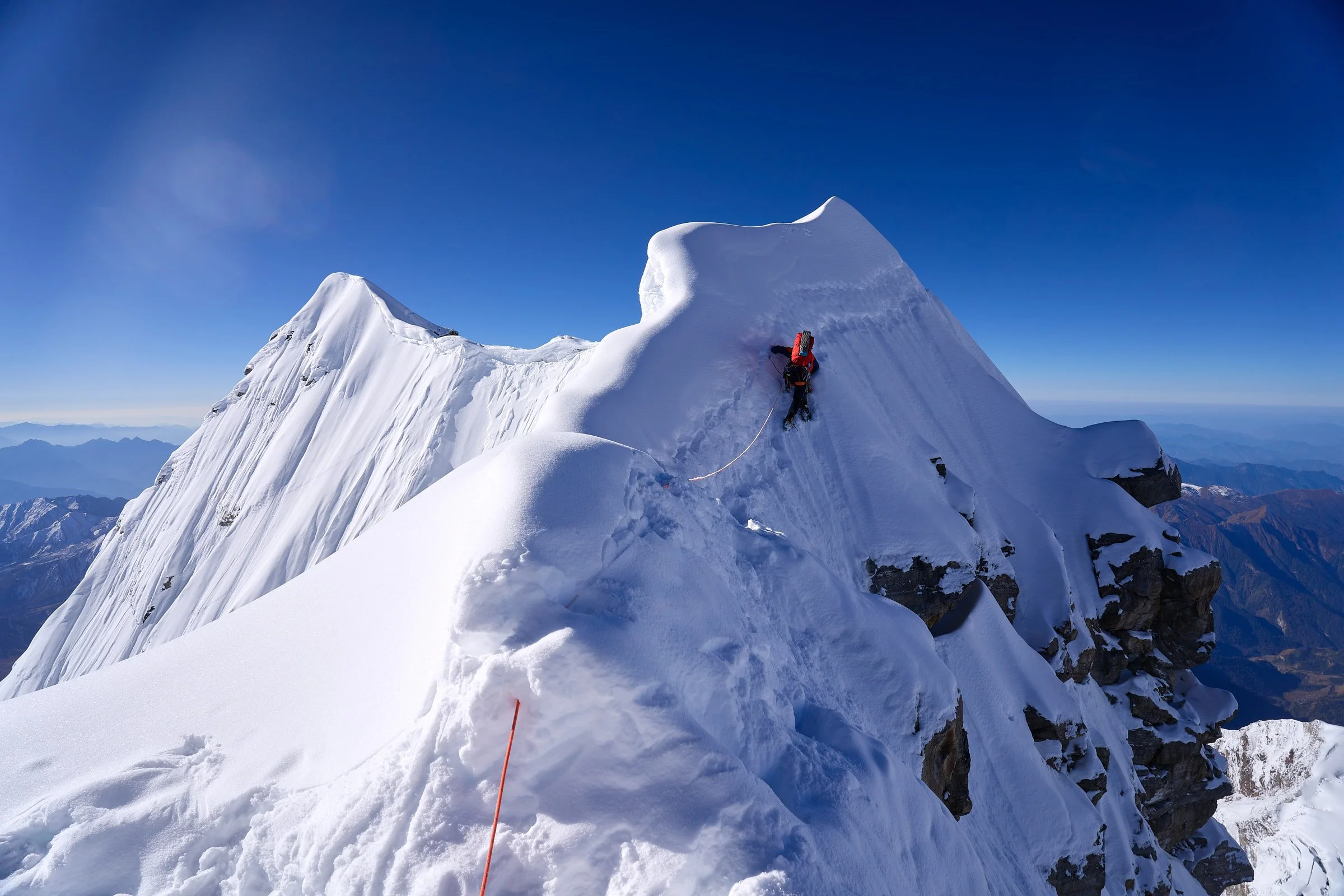 Descending back along the mile long length of ridge on the second peak we attempted.jpg