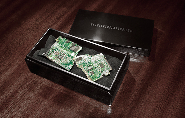 Cryptic boxes with broken laptop parts were sent to the press with our URL.