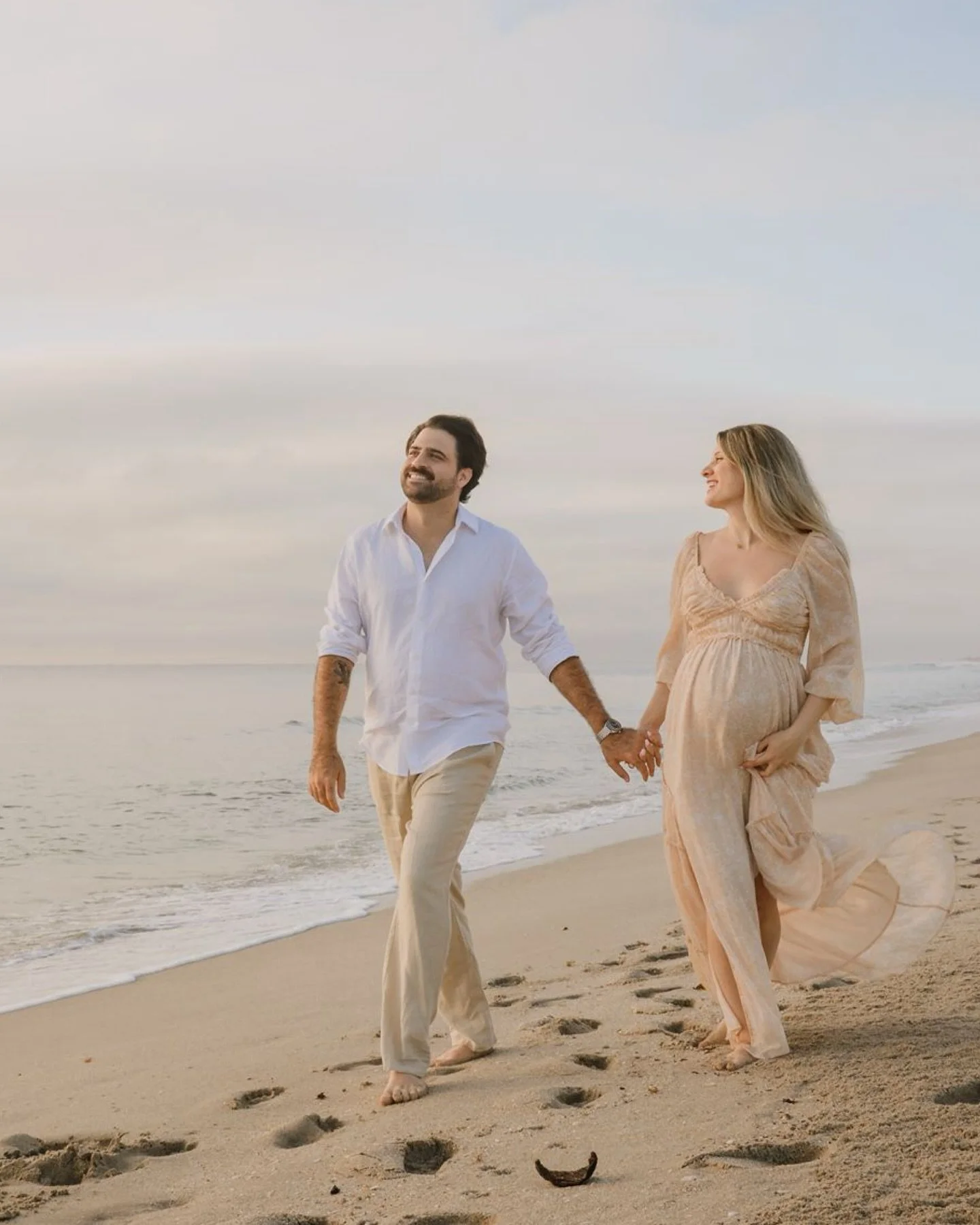 A moody sunrise that turned into the most magical golden glow right on time. @lisapupil 

(golden hour, maternity session, beach, maternity pictures, sunrise)