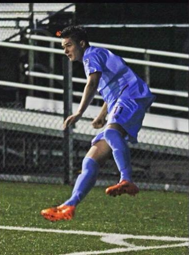 Riley 'The Pom' whipping a corner in