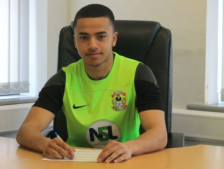 Signing professional terms with Coventry City