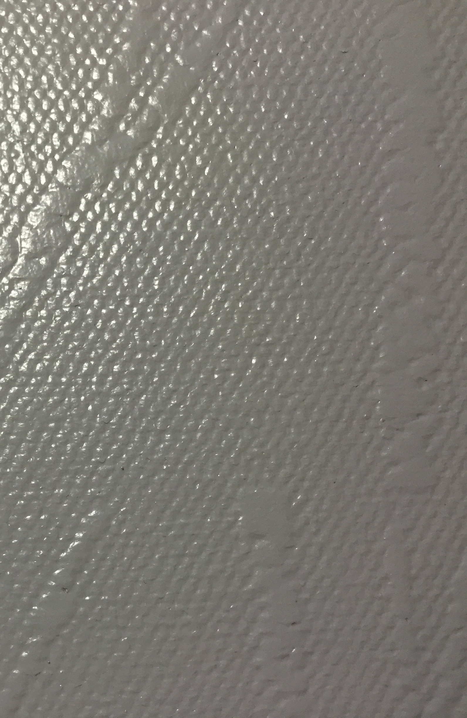 (above: VRP wallcovering comes in a wide variety of textures; far above: a sample microvented vinyl)