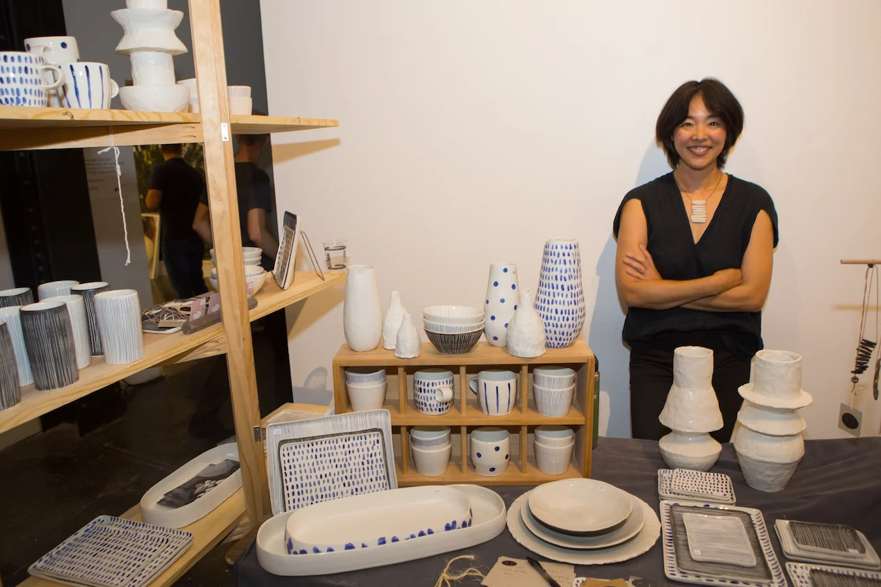 Pittsburgh-based artist Reiko Yamamoto (CSA PGH 2015 Artist) stands proudly with her modern, versatile and functional pottery and jewelry.