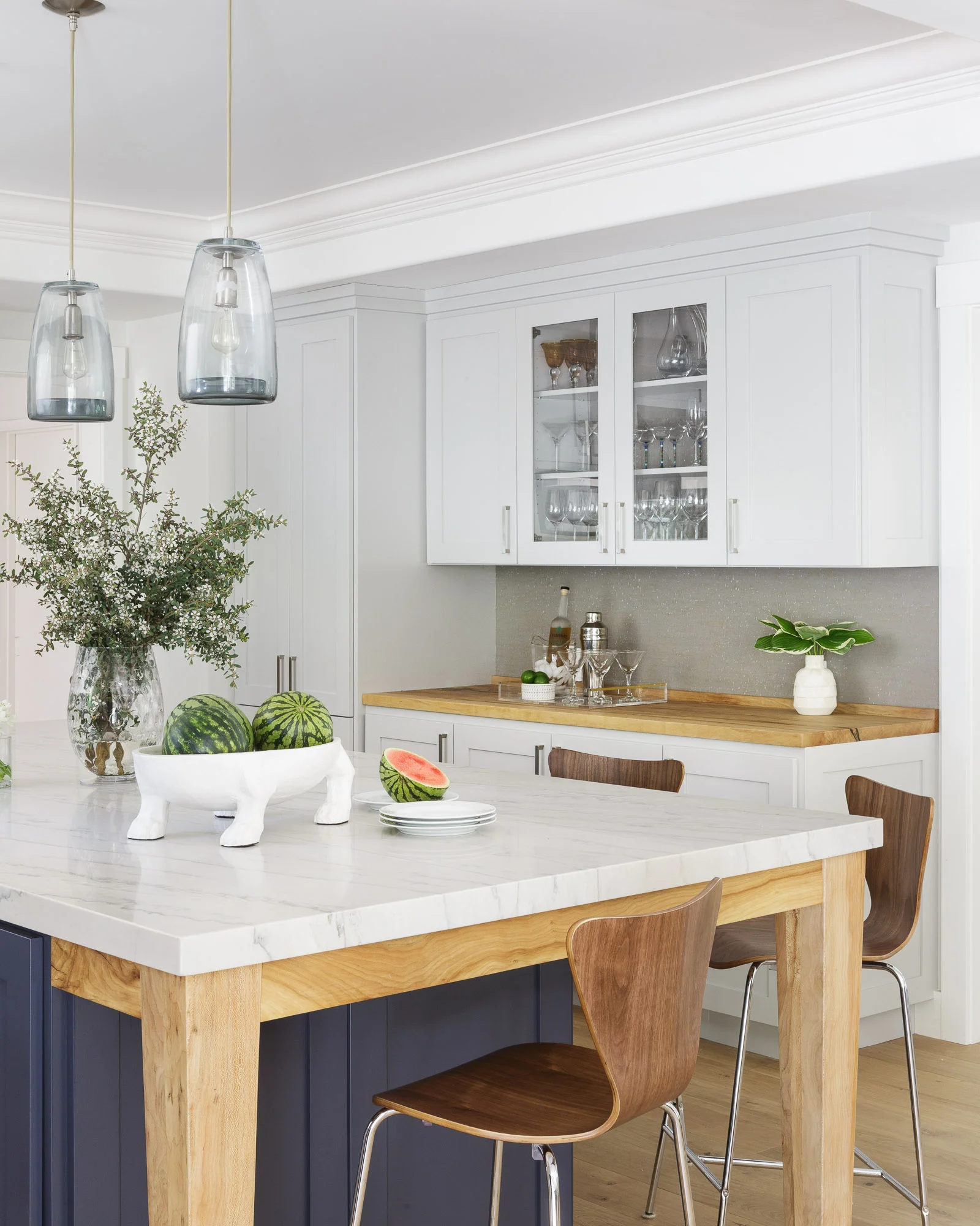 Bleached wood tops this kitchen bar in this Lafayette, California transitional kitchen