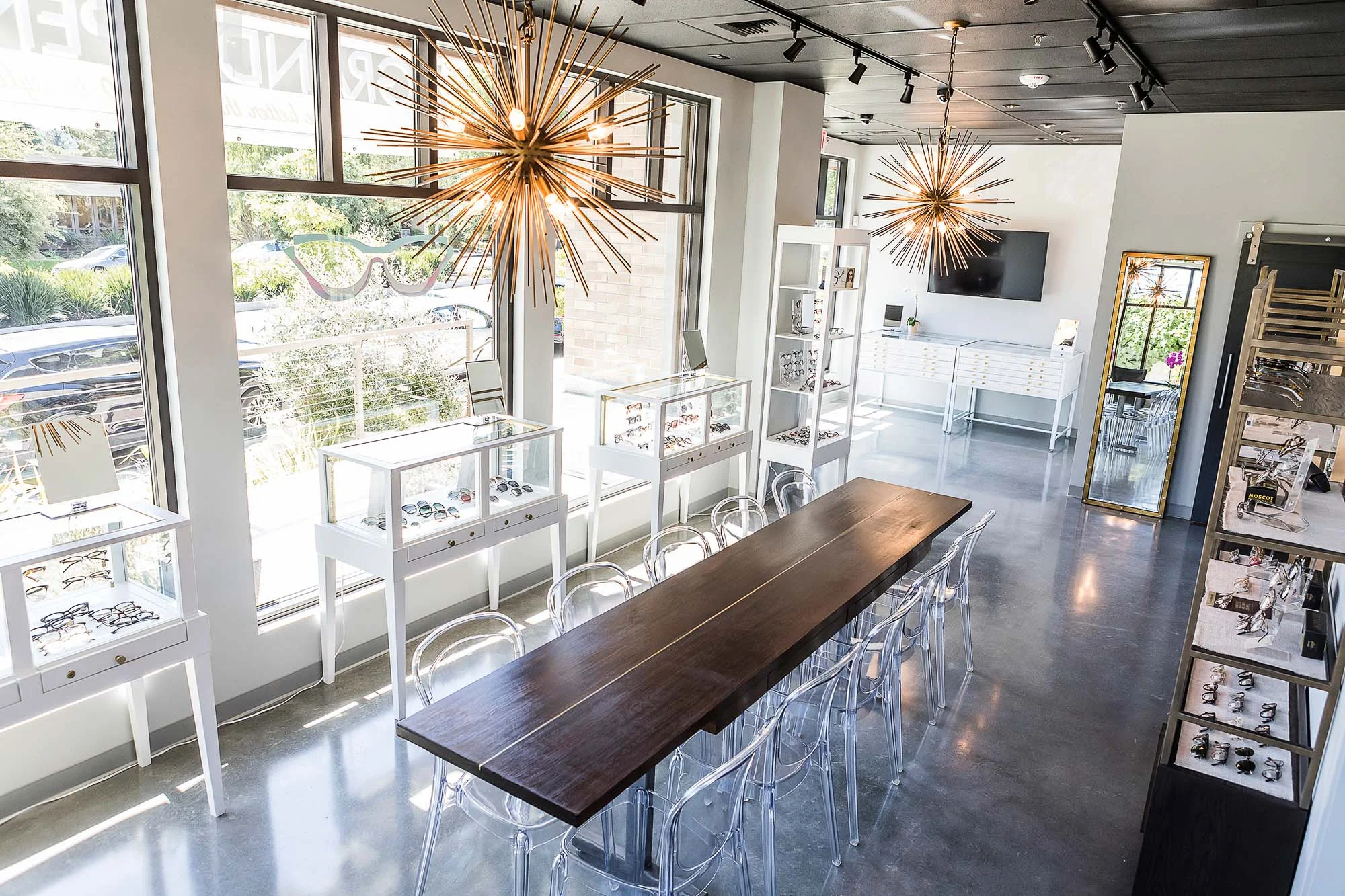 The brass lighting in this stylish Lafayette, CA commercial space is a show stopper.