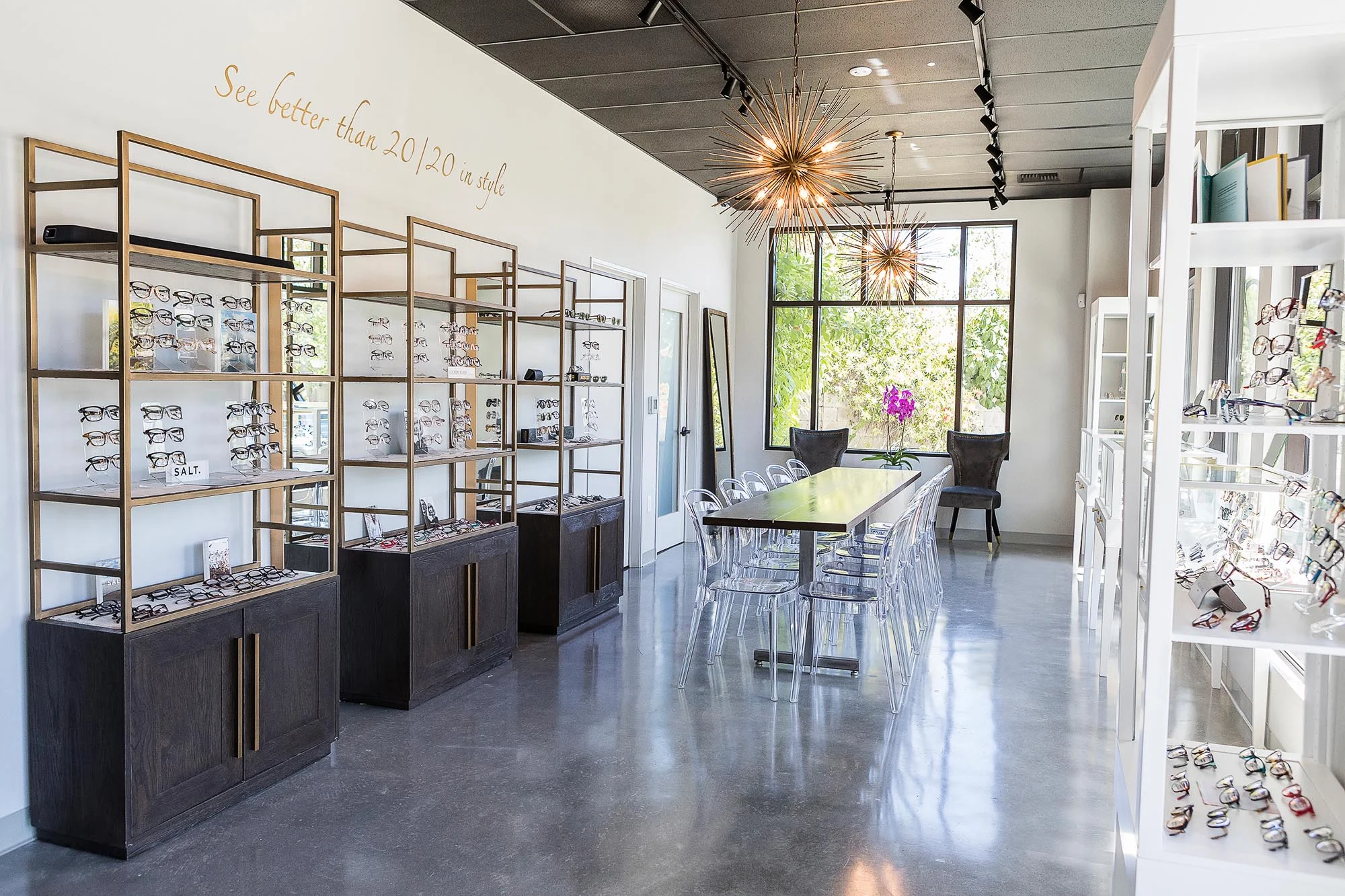 The Lafayette, CA commercial space pairs cool polished cement flooring with warm woods and brass accents.