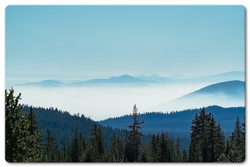 When shooting landscape photography, &ldquo;go around the teacup&rdquo;. Take your time - look for an interesting composition.  Play with light to achieve a layering effect.

I shot this at Crater Lake.  The interesting scene, in this case, was not t