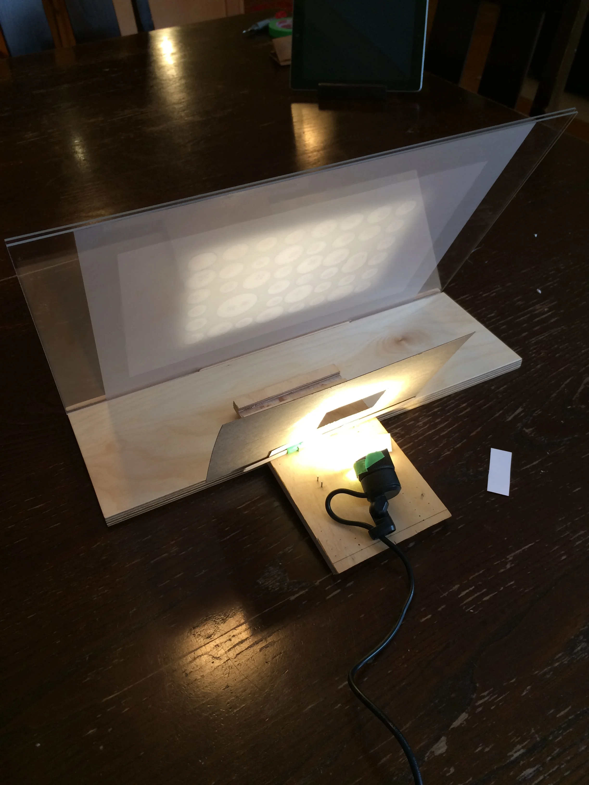  Early proof of concept work with the cardboard and tape holding things together.&nbsp;Thanks to Peter Ma for his lighting expertise. &nbsp;I ended up using LED outdoor garden lights from Canadian Tire and modifying them. 