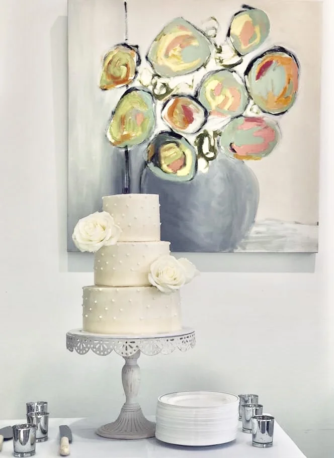 Wedding cake by culinary artist Alethea Kendrick Cowie; painting by artist Isabelle Gautier.