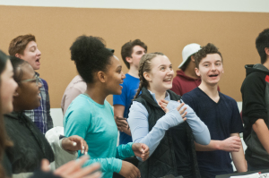 Members of the cast in rehearsal