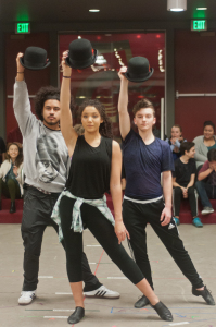 Performing students Javier Luna, Shelby Willis and Tom Bentson rehearse “Steam Heat”