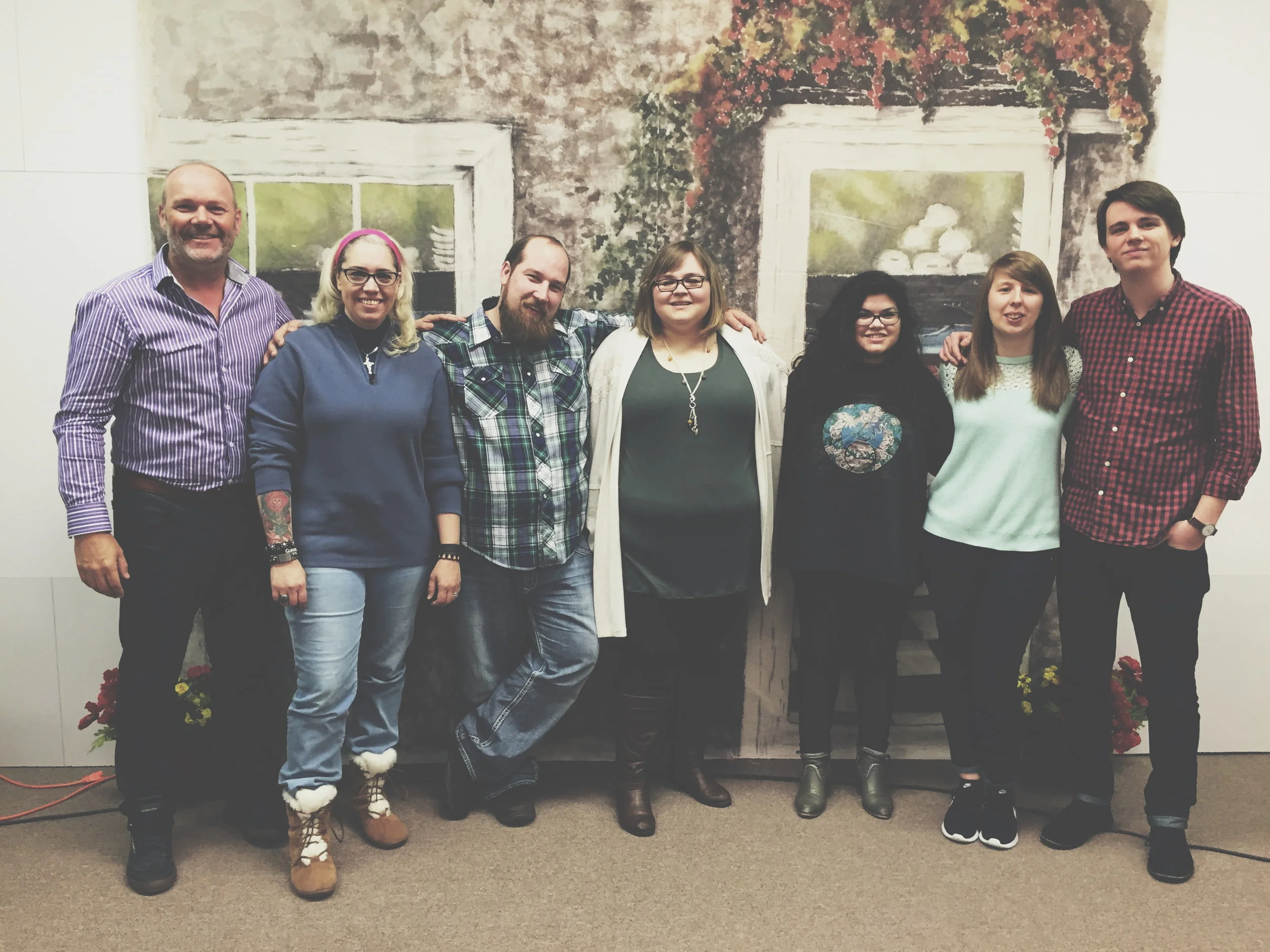 Jon Burns (president of GEM) and new missionaries under GEM. 