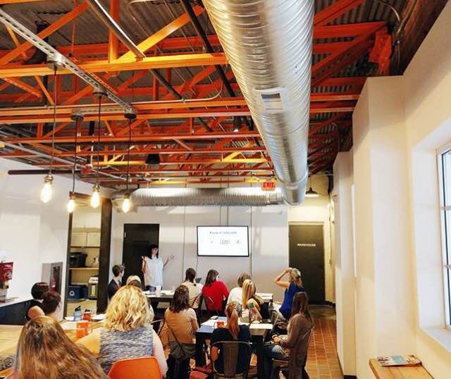 A room full of entrepreneurs learning from Sarah!