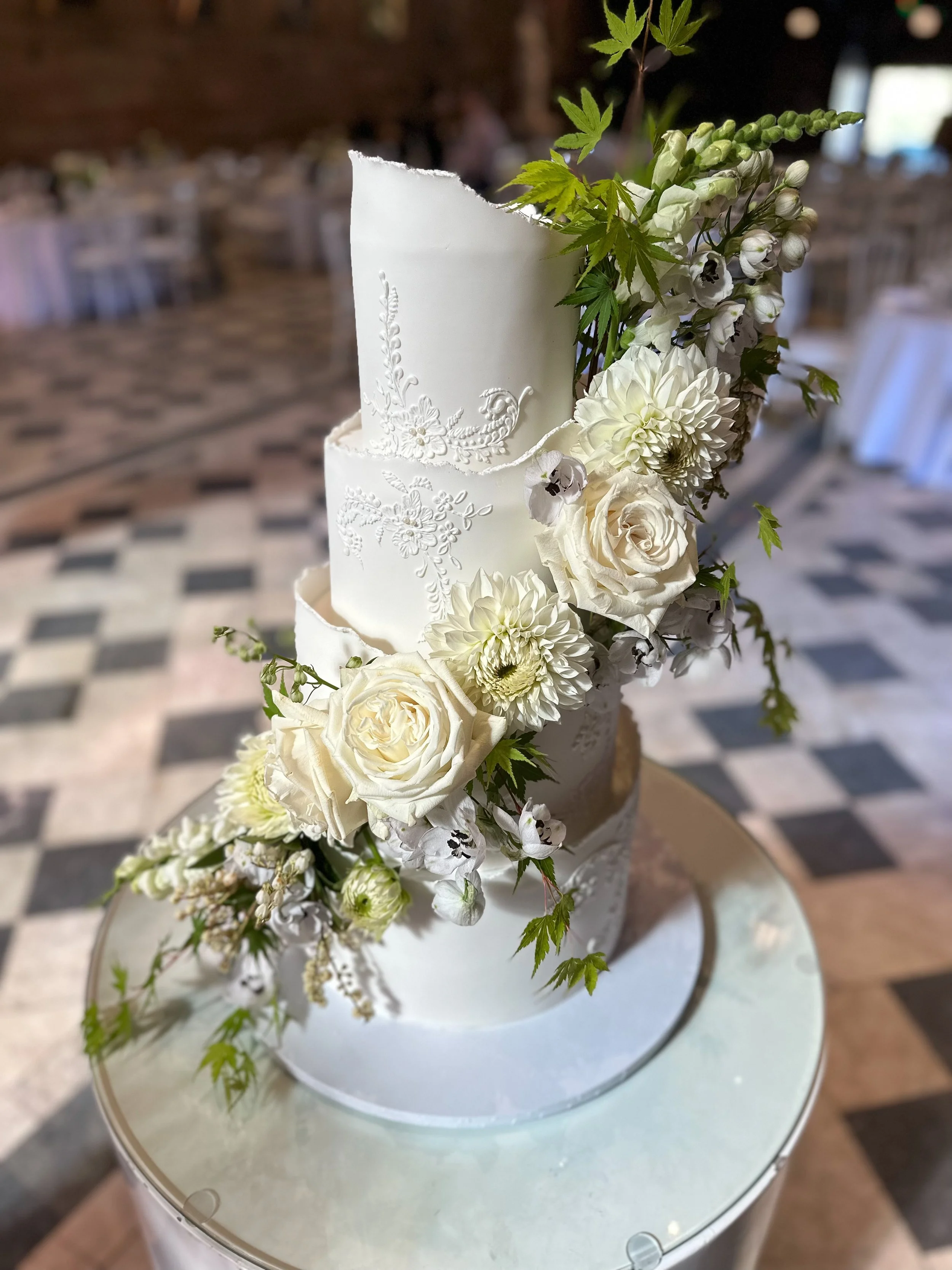 Four tier custom lace with flower cascade