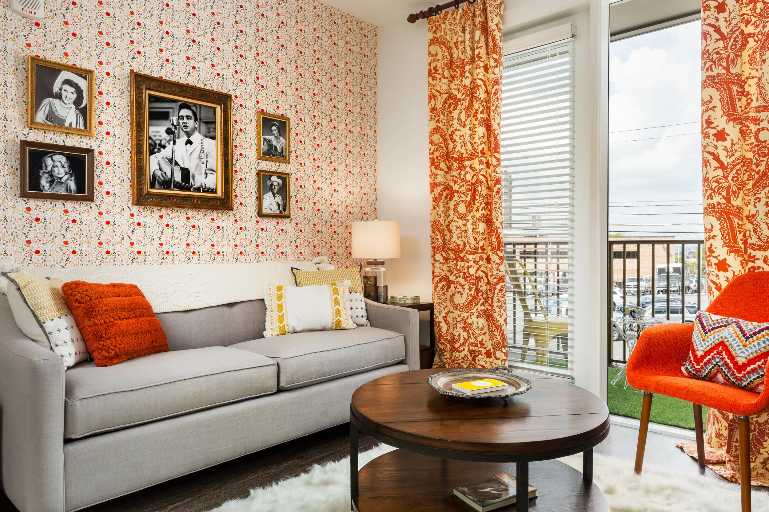 Book Unit 245 through ParallelTravel.co to stay at this Nashville AirBNB inspired by Robert's Western World. Vintage inspired wall paper is the accent wall with all of Nashville's country favorites.