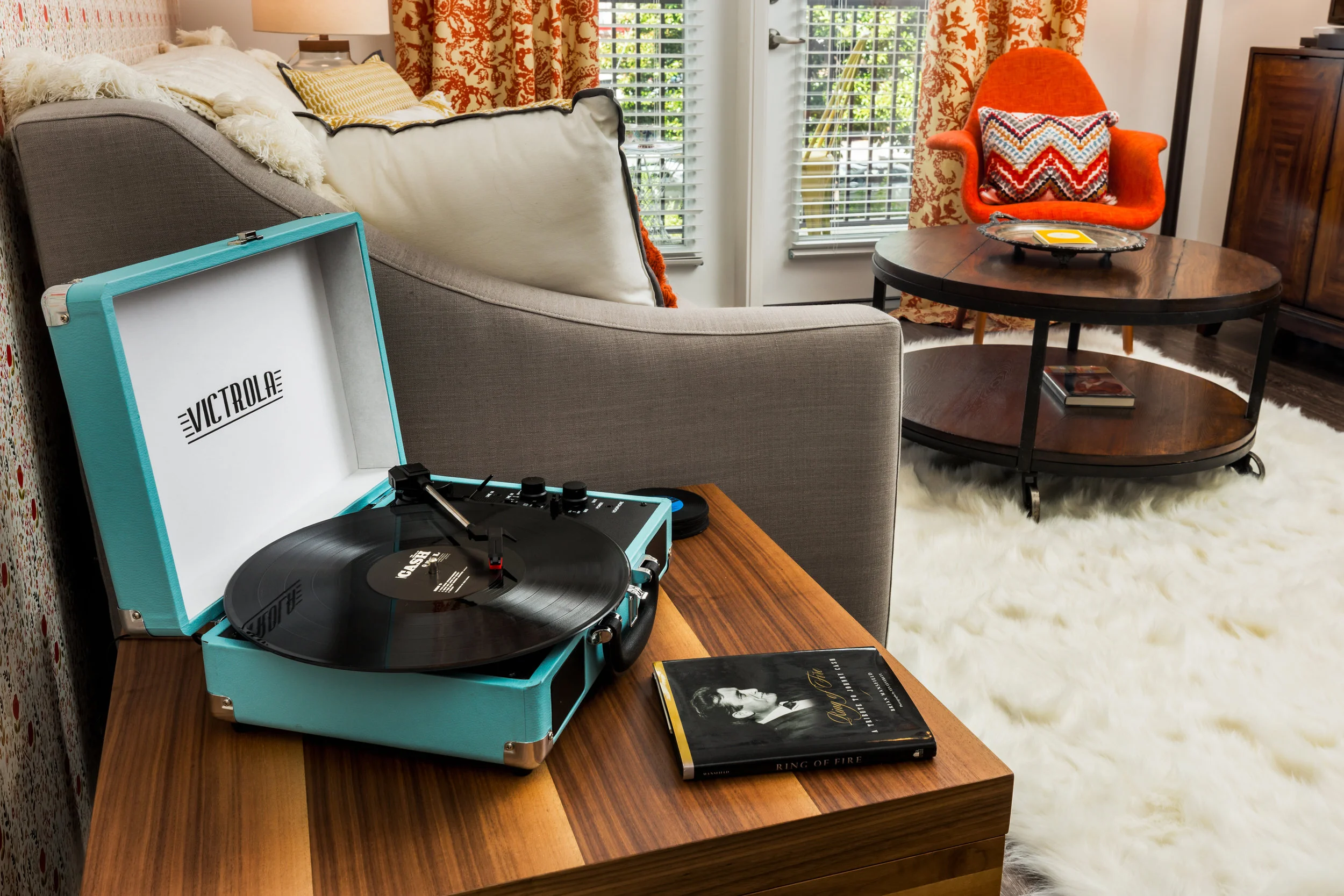 Play yourself some vintage records with this teal Victrola Record Player.