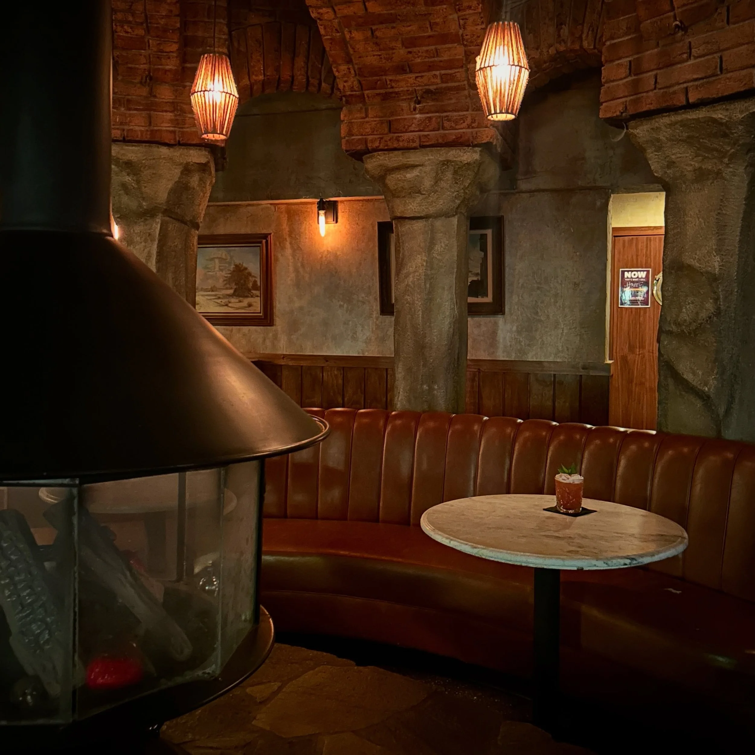Bricks &amp; Drinks

The High Low is located in a cozy brick vaulted building constructed in 1937.

Before it became a bar, it was a famous Atwater Village joint called La Strada Restaurant and Opera Cabaret owned by Carmelo Manto. 

According to the