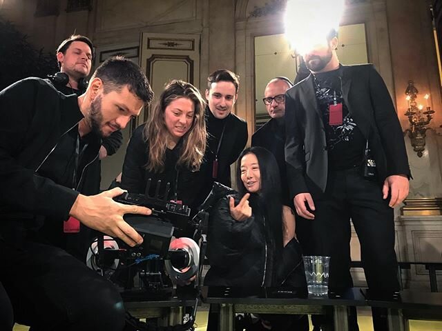 Using his new 2-axis Inertia Wheels kit and a Movi Pro, operator @dqcamera shows fashion icon @verawang playback on set during fashion week. #inertia #cameramovement #wheels #movimethod #movipro #m15 #m10 #m5 #ronin2 #ronin #ronins #tiltagravity #mov