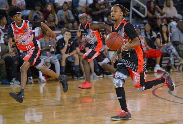 Orange black and white basketball uniforms jerseys and pants