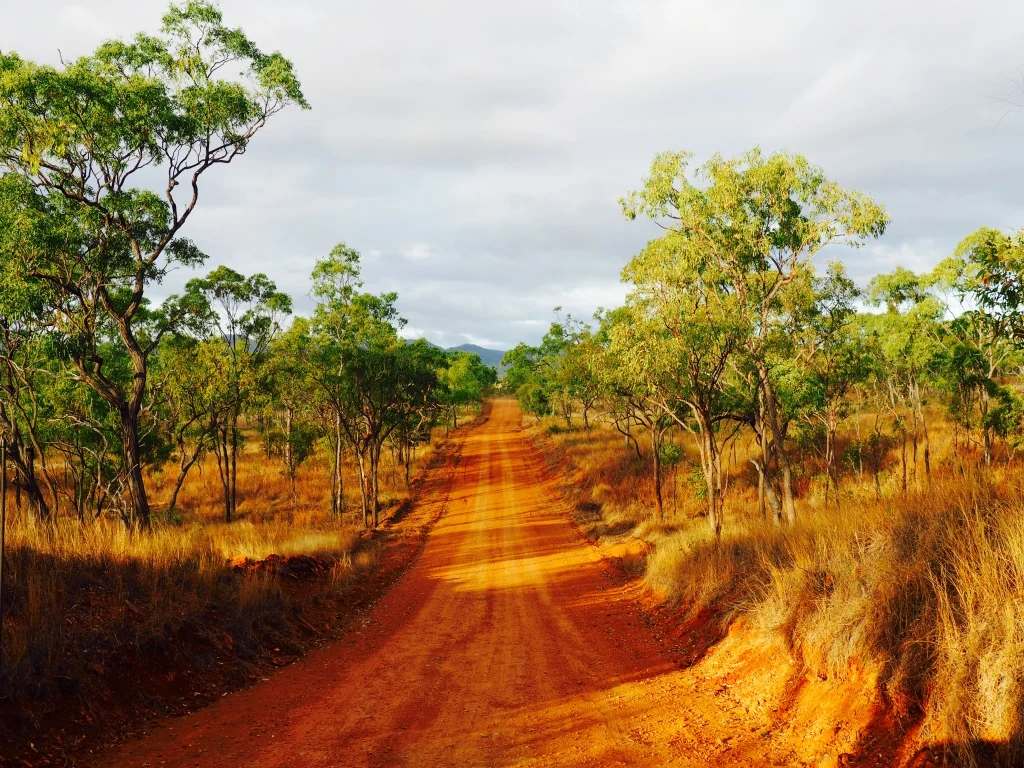 Heading off sealed roads by four wheel drive the dry red dirt of Australia beckons us westward towards the setting sun