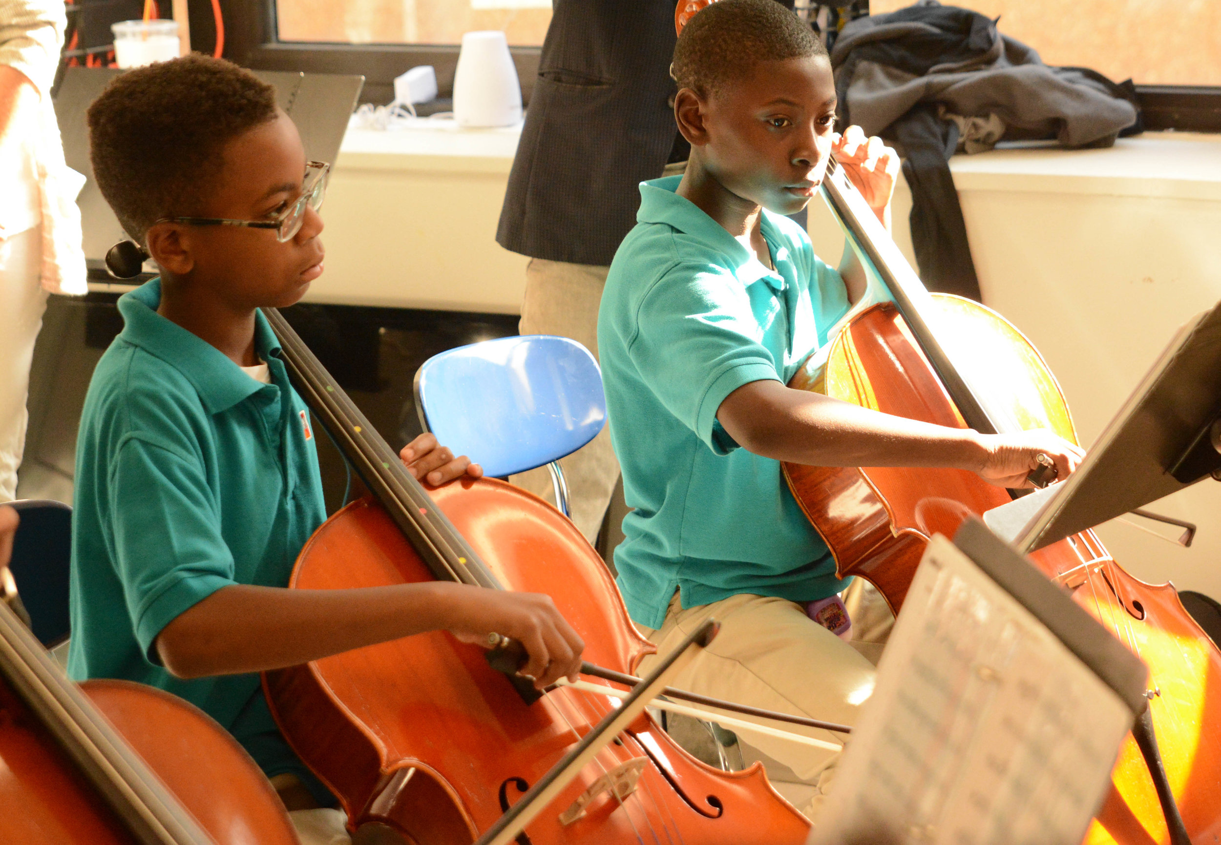 6th graders in the Abbado string orchestra concentrate play "Ride of the Valkyries."