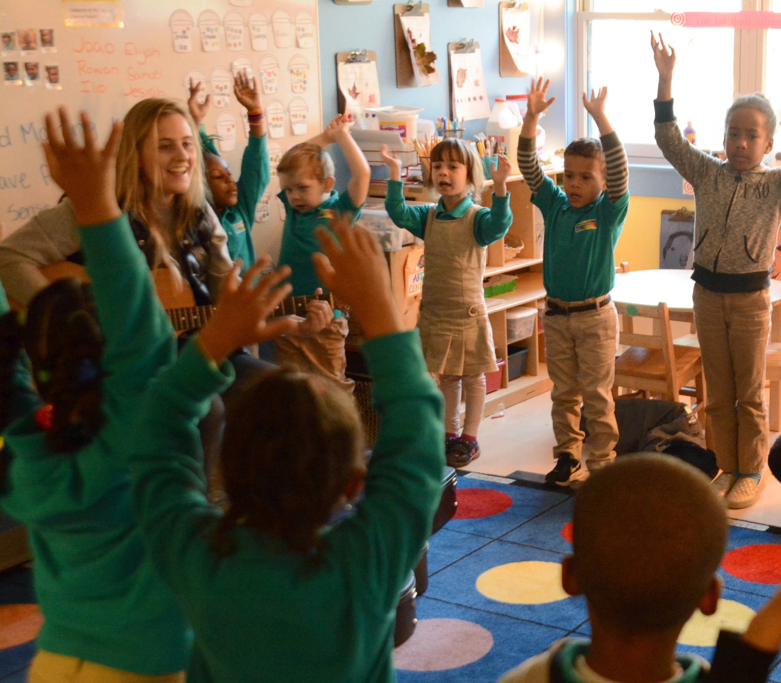 Ms. Plotkin sings with her class during K1 El Sistema.