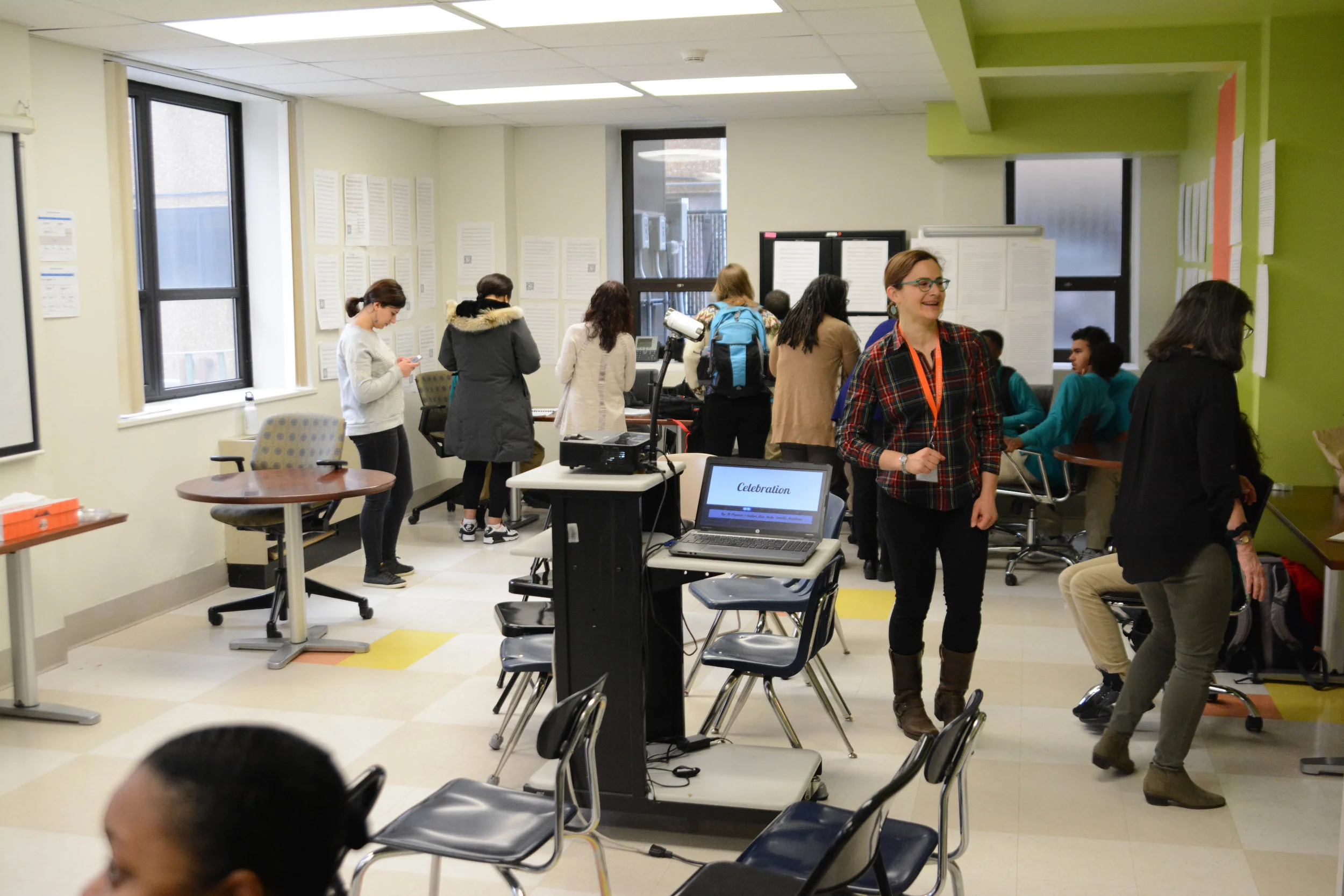 Ms. Schibuk, center, at the classroom celebration.