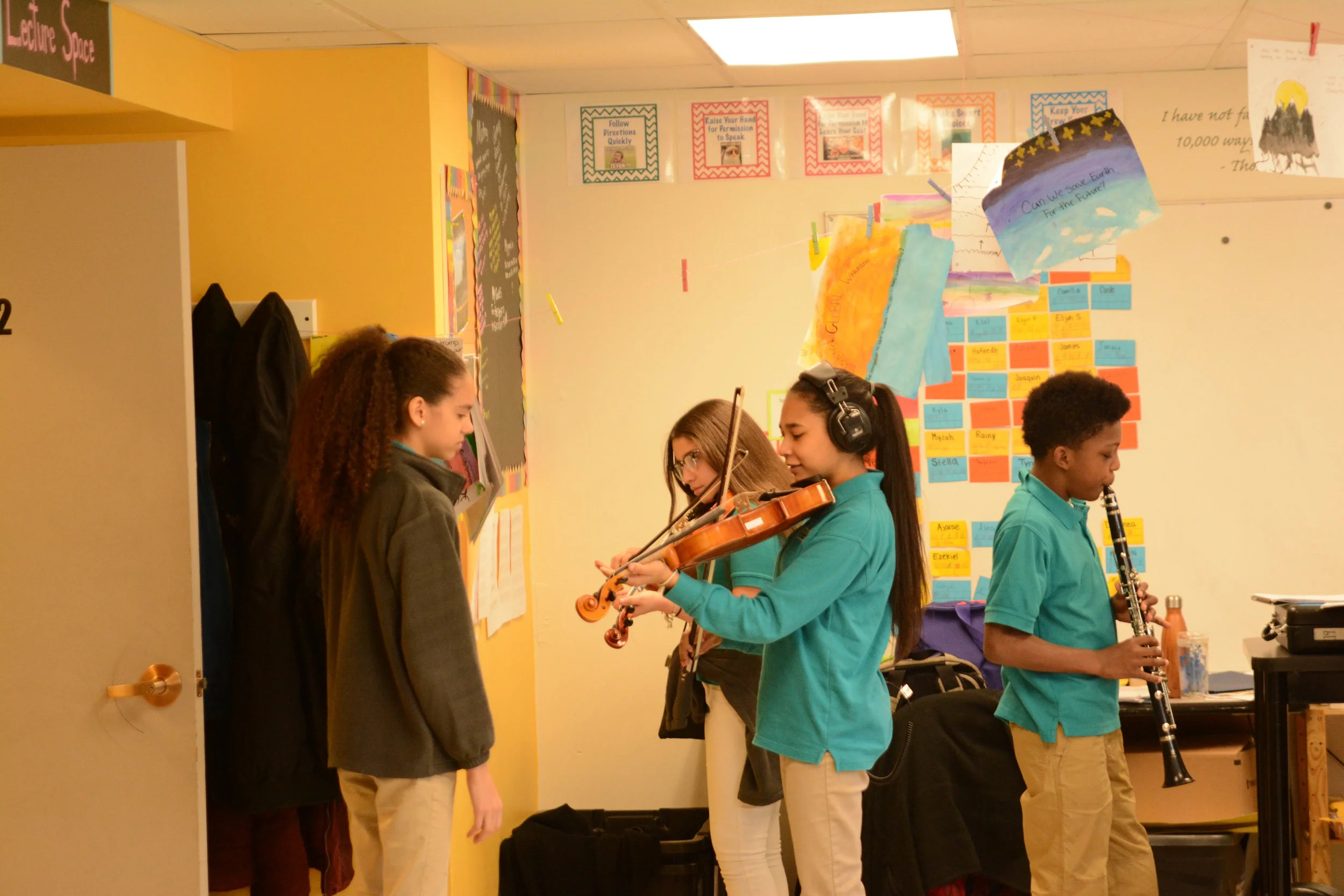 Students practicing their self-composed pieces.