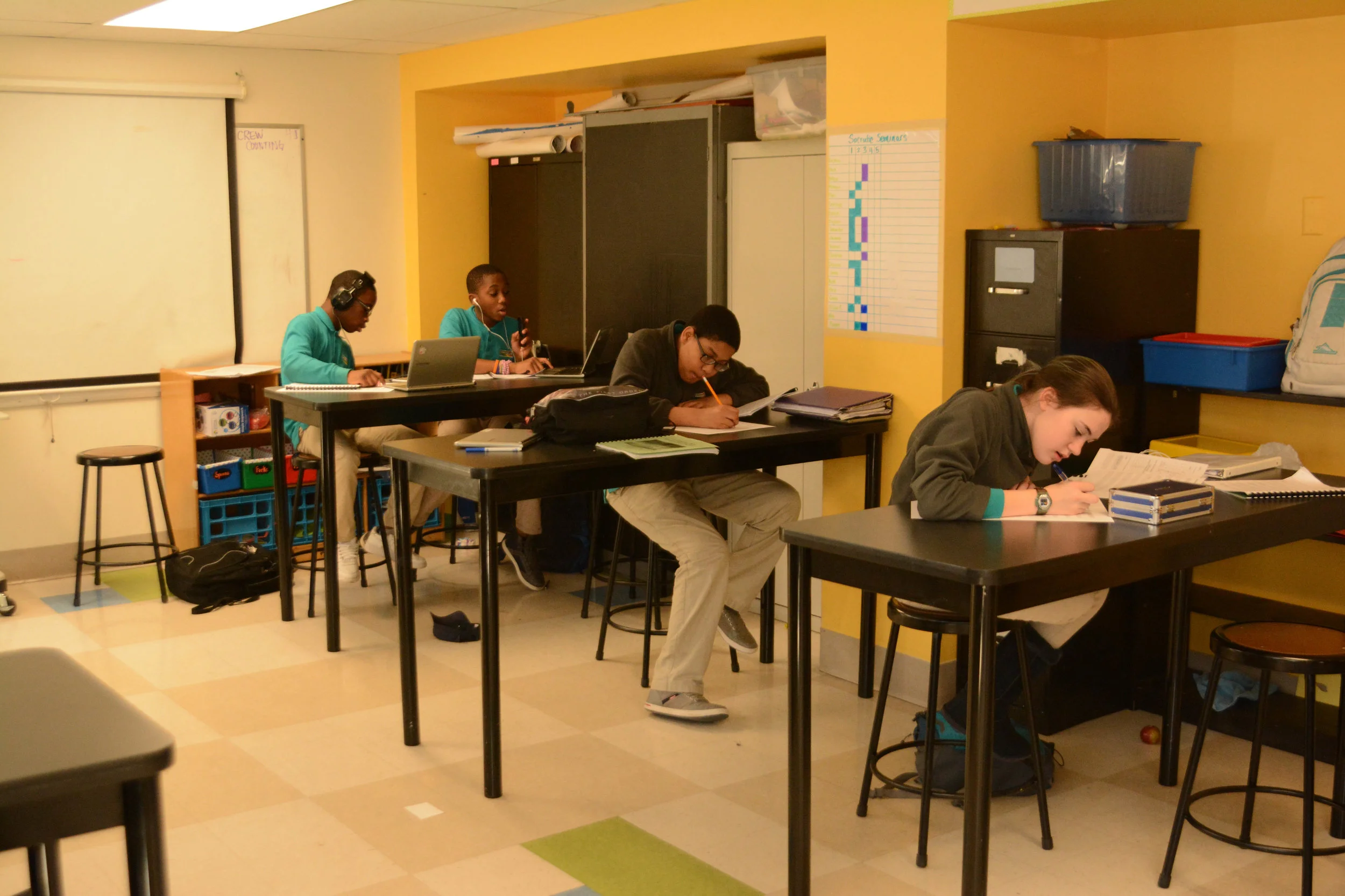 7th graders writing their reflections.