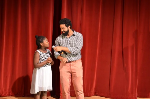 Onstage at a concert.