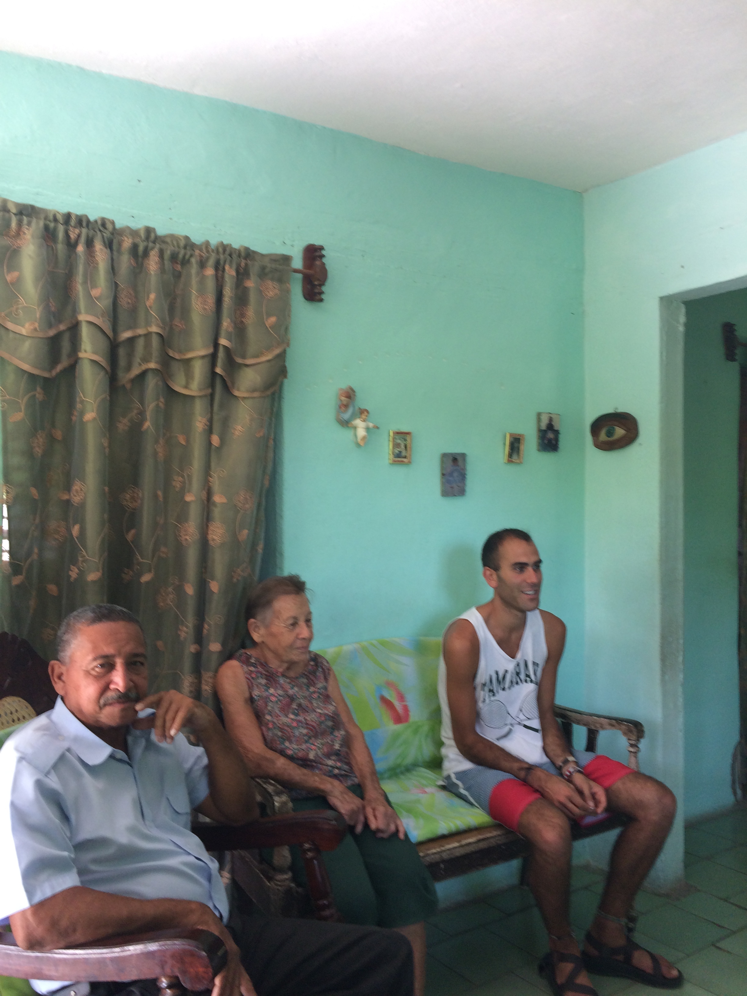 Members of Margarita's family, and my son (far right), watch the film.