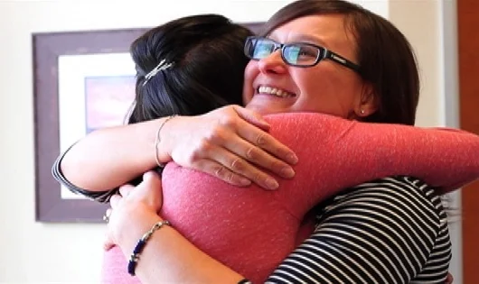 Alana and Alex hug.jpeg